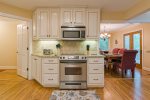 Fully Equipped Kitchen with Granite Countertops & Stainless Steel Appliances